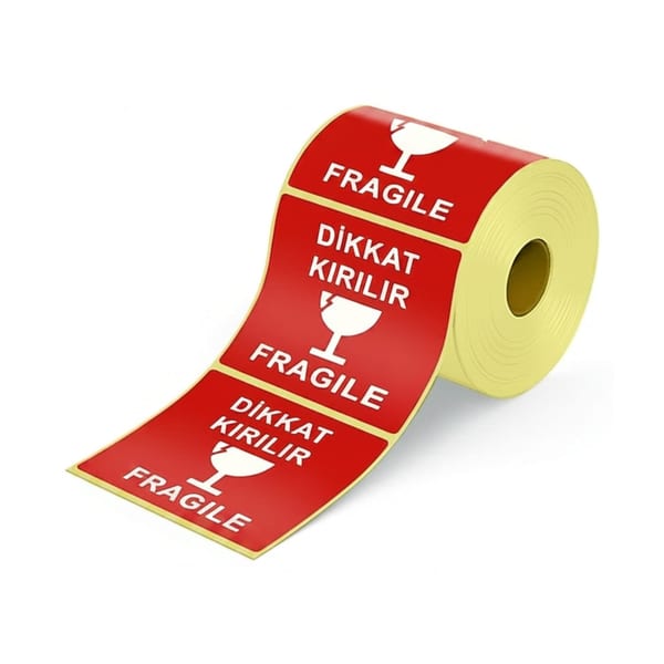Dikkat kırılır küçük uyarı etiketinin paket yandan bakışla duruşu
